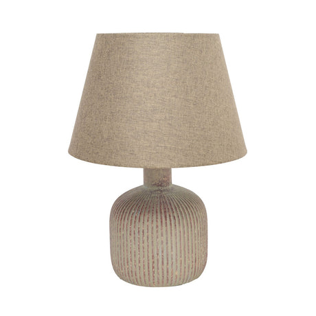 Round ribbed ceramic table lamp, 42cm, with a distressed sage-beige and rust-red glazed bottle base and a tapered beige fabric shade, shown on a plain white background.