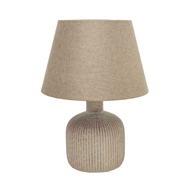 Round ribbed ceramic table lamp, 42cm, with a distressed sage-beige and rust-red glazed bottle base and a tapered beige fabric shade, shown on a plain white background.