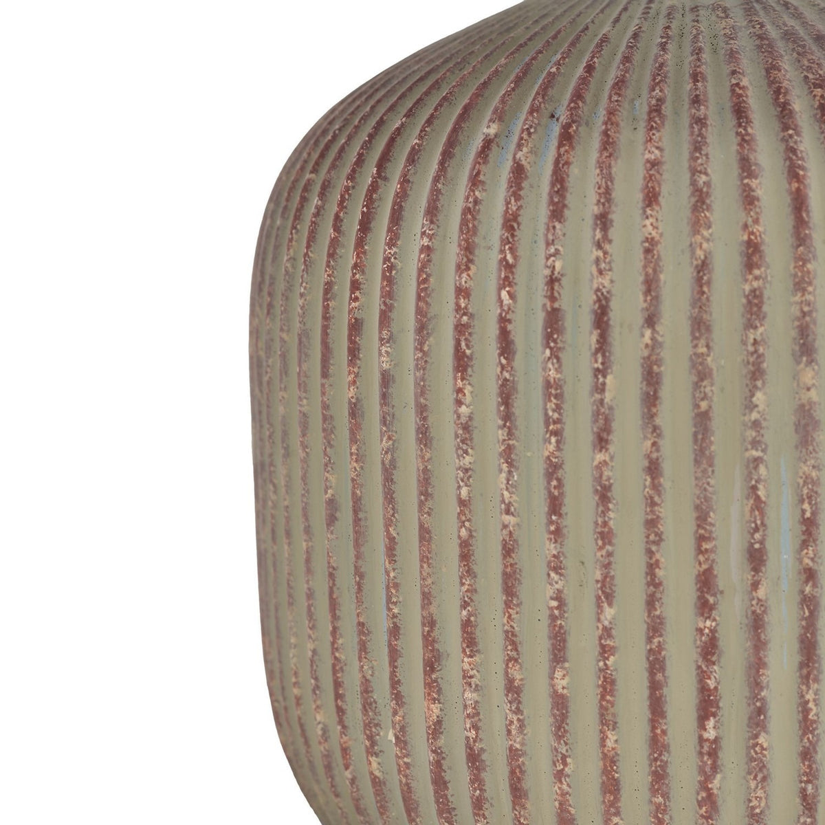 Close-up of the Round Ribbed Distressed Ceramic Table Lamp 42cm base, showing fine vertical ribs in sage-beige with rust-red distressed grooves, on a plain white background.