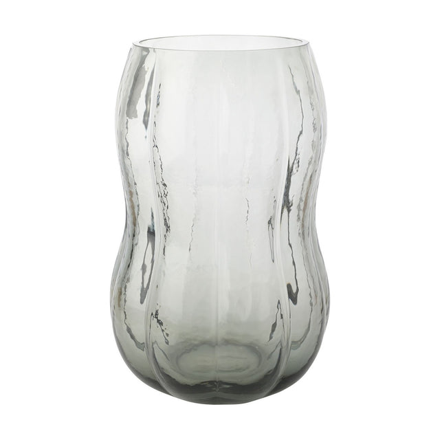 Tall hourglass glass vase with ribbed, rippled texture in clear glass with a smoky grey tint deepening towards the base, shown on a plain white background.