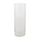 Tall straight-sided hammered style drinking glass in clear glass with a round base and smooth rim, shown on a plain white background.