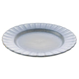 Small round stoneware plate with a scalloped edge and fluted rim in a speckled blue glaze fading to pale grey-blue at the centre, shown on a white background.
