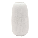 Tall Oval Ribbed Pierced Dot Ceramic Table Lamp, 33cm, in white with vertical ribbing and scattered pierced dots densest at the centre, shown on a plain white background.