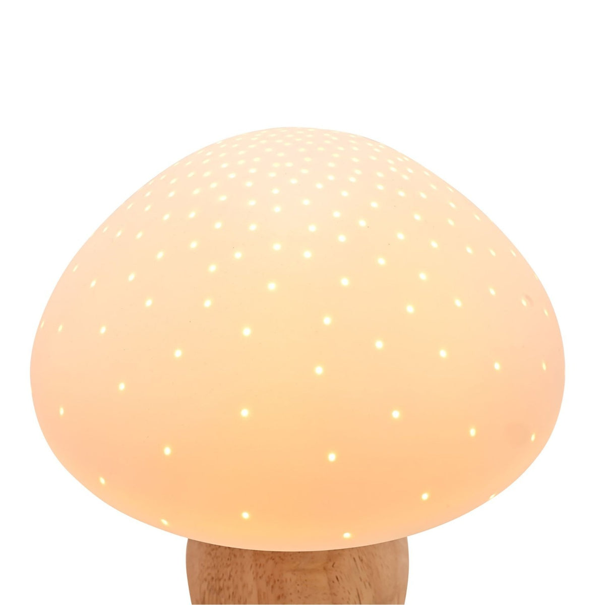 Pierced Mushroom ceramic table lamp with a rounded white dome pierced with small glowing holes, set on a natural wood stem, shown against a plain white background.