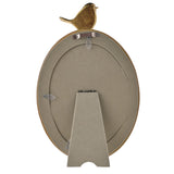 Back view of the Wood Effect Oval Resin Photo Frame with Gold Bird, showing a grey easel stand, hanging brackets, and the gold bird perched at the top edge, on a white background.