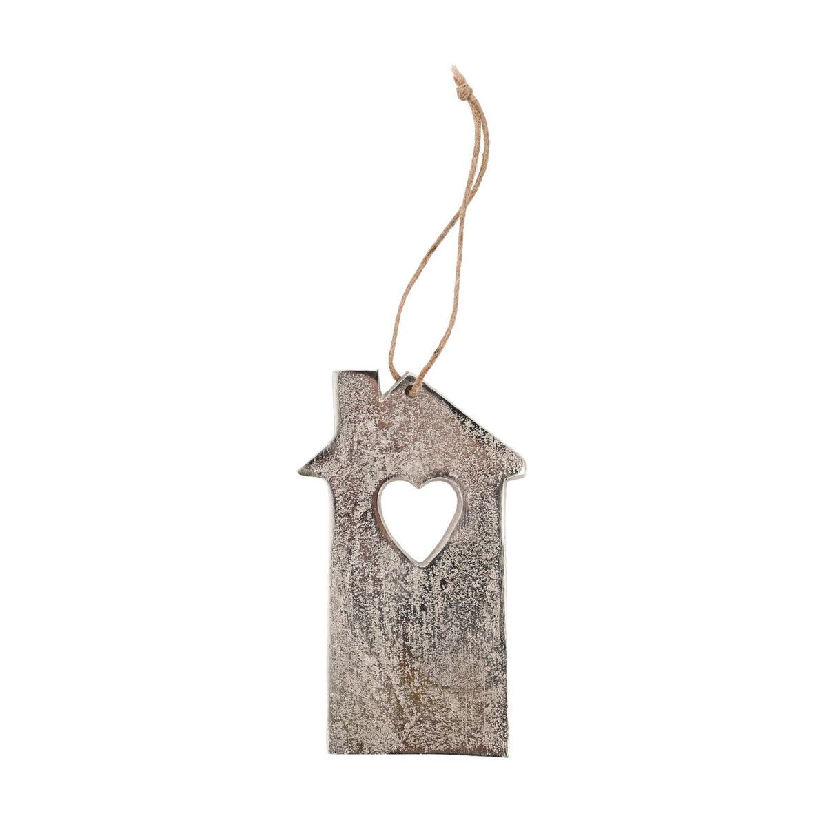 Hanging house-shaped metal plaque in textured silver with mottled grey tones, featuring a pitched roof, chimney, and heart cut-out, hung on jute cord against a white background.