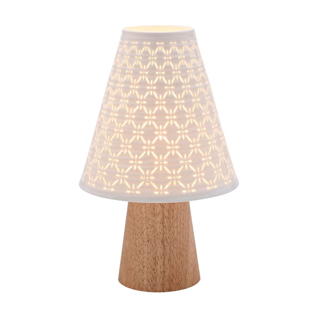 Pierced Cone Ceramic Table Lamp with Wooden Base in white, featuring a tapered wood base and a ribbed, pierced ceramic shade glowing warmly, shown lit on a plain white background.