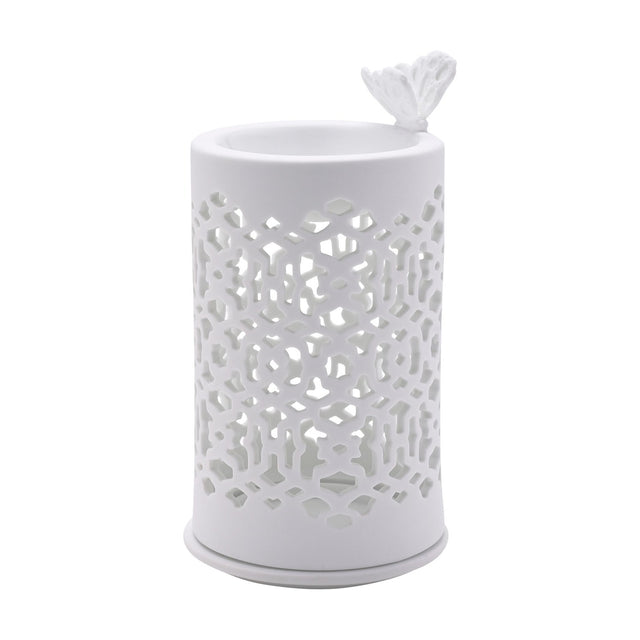 Round white ceramic wax melt burner with cut-out lattice pattern body and a small butterfly perched on the rim, shown on a plain white background.