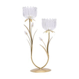 Two stem flower glass candle holder with ridged clear glass cups on gold stems, leaf details, and glass bud accents on an oval gold base, shown on a plain white background.