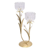 Two stem flower glass candle holder with gold metal stems and leaves, clear ridged glass cups shaped like open blooms, set on a round gold base against a plain white background.