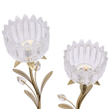 Two stem flower glass candle holder with clear ridged glass cups on gold metal stems, gold leaves and glass bud details, shown against a plain white background.