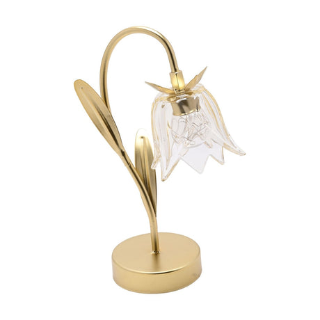Glass Flower Single Stem LED Table Lamp in gold, with a curved arch stem, two leaf details, round base, and a clear bell-shaped glass bloom, shown on a plain white background.