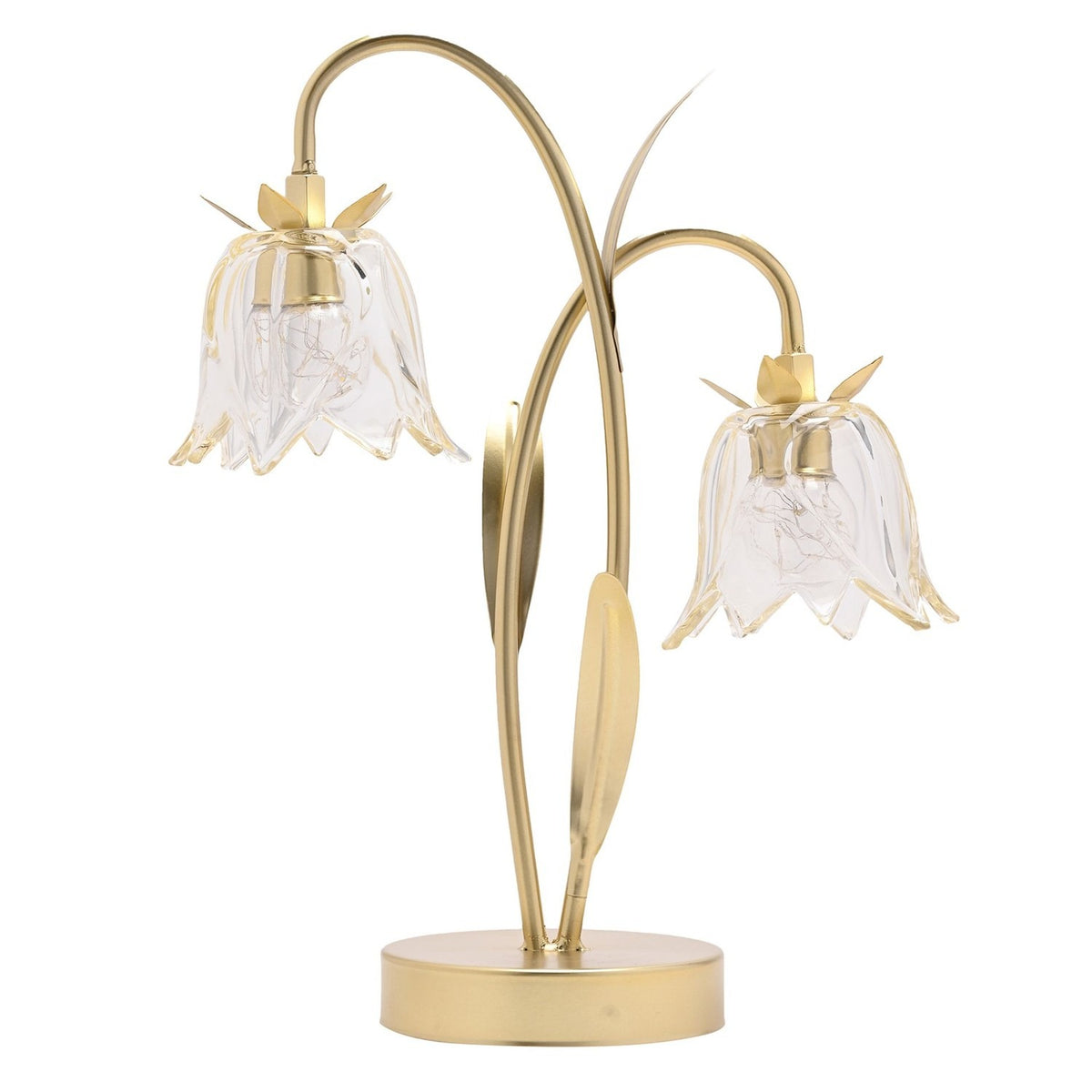 2 stem LED table lamp with gold metal frame, leaf details and round base, featuring clear bell-shaped glass flower shades with a faint champagne tint, on a plain white background.