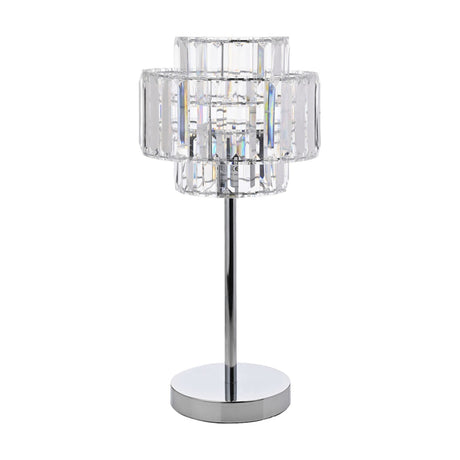 Glass table lamp with a tiered crystal effect shade in clear glass prisms, set on a slim chrome stem and round chrome base, shown on a plain white background.