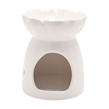 White ceramic wax melt burner shaped like an open flower, with a scalloped petal dish atop a rounded base with an arched tealight opening, on a plain white background.