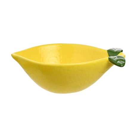 Small lemon-shaped earthenware dish in glossy yellow with dimpled peel texture and two green leaf details at one end, shown on a plain white background.