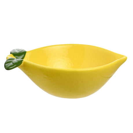 Small lemon-shaped earthenware dish in glossy yellow with a pointed tip and two green leaf details, dimpled peel-like texture, on a plain white background.
