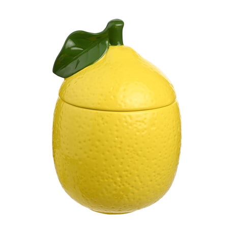 Lemon-shaped earthenware storage jar in glossy yellow with dimpled citrus-textured surface and a green leaf and stalk lid detail, shown on a plain white background.