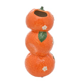 Stacked Triple Citrus Blossom ceramic vase, 21cm, shaped as three oranges with dimpled peel texture, glossy orange finish, green stalk, and raised white blossom details, on a plain white background.