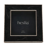 Square metal photo frame in black with a fine gold edge, deep box profile and distressed gold sides, for a 5 x 5in print, shown on a white background.