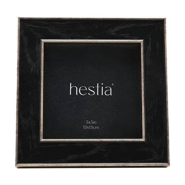 Square metal photo frame in black with a fine gold edge, deep box profile and distressed gold sides, for a 5 x 5in print, shown on a white background.