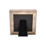 Square metal photo frame, 5 x 5in, with black panel and distressed antique gold edge, black easel stand on back, shown on a plain white background.
