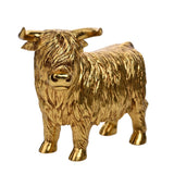 Small Standing Shaggy Highland Cow Resin Figurine in Gold, textured coat detail and curved horns, standing on four hooves against a plain white background.