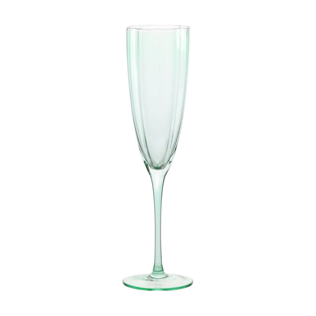 Green scallop stemmed glass champagne flute with panelled bowl, scalloped rim, slim stem and round flat foot, shown on a plain white background.