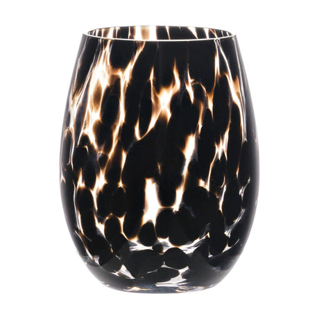 Glass tumbler from a set of two with a black and clear tortoiseshell pattern, rounded egg-shaped body, curved base and fine rim, shown against a plain white background.
