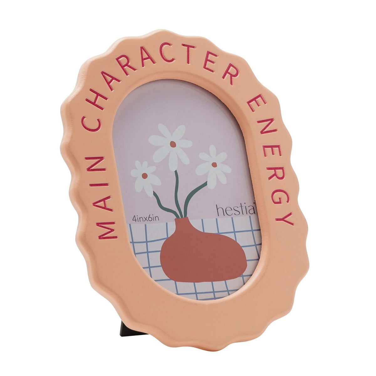 Wooden oval photo frame in pale orange with wavy edge, "Main Character Energy" in pink lettering, holding a 6 x 4in portrait photo on a white background.