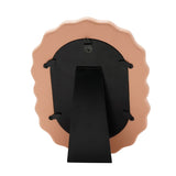 Back view of the Main Character Energy wooden photo frame in orange, showing a black oval backing, support stand, and hanging hook on a plain white background.