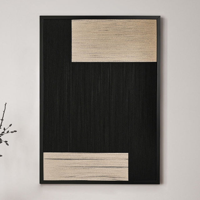 Framed Woven Thread Wall Art, 50cm x 70cm, with vertical black threads and two crosswise cream blocks, black frame, hung on a plain light wall.