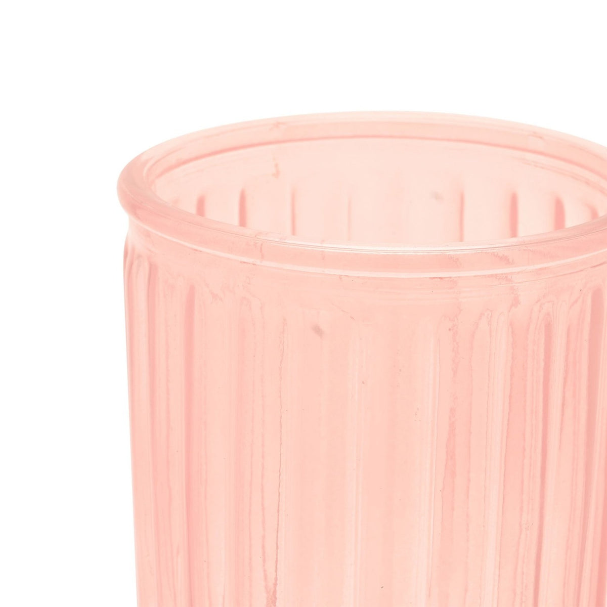 Close-up of the Tall Ribbed Cylindrical Glass Flower Vase in pink, showing fine vertical ridges and a smooth rolled rim against a plain white background.