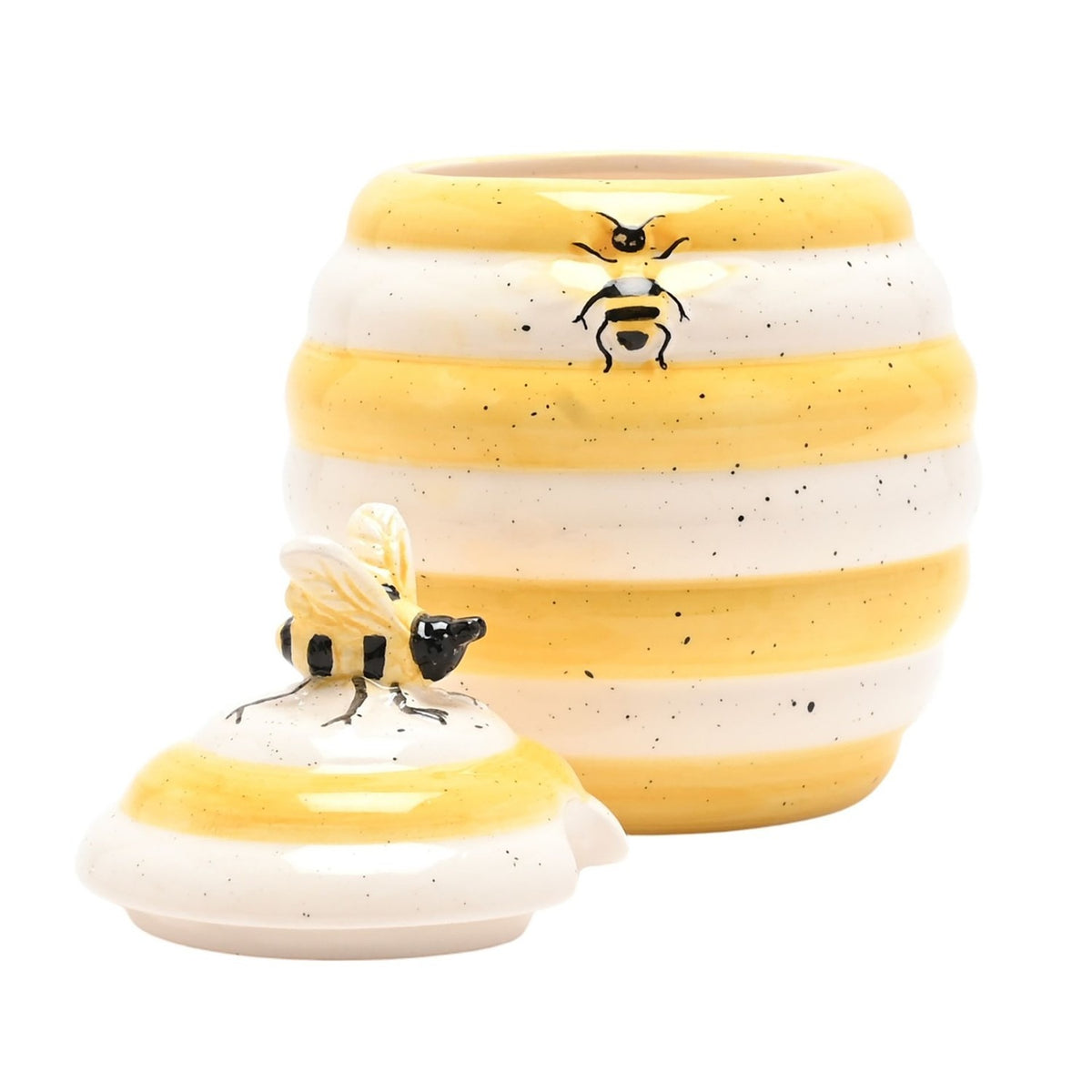 Bee Hive earthenware honey pot storage jar in white and yellow ribbed stripes, with a sculpted bee on the lid knob and another on the jar's side, lid removed, on a plain white background.