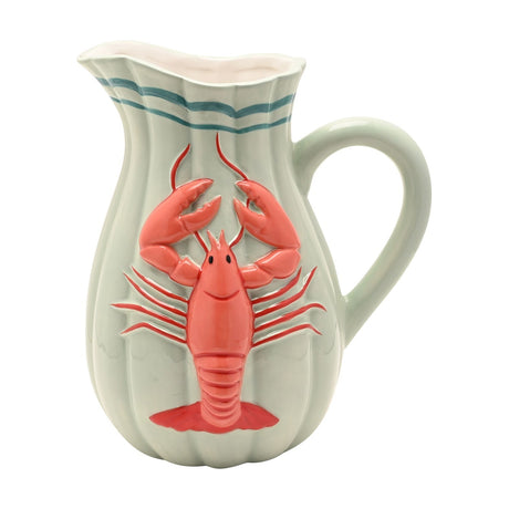 Hand-painted ceramic jug vase in pale green with vertical flutes, a wavy rim, teal bands near the edge, a curved handle, and a raised coral lobster design on the front, shown on a white background.