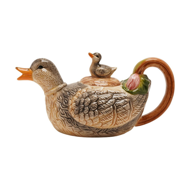 Earthenware duck-shaped teapot, 840ml, in beige and grey with textured feather detail, orange beak spout, duckling lid knob, brown handle and pink floral accent, on a white background.