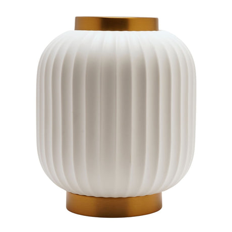 Small ribbed lantern-style porcelain table lamp in matt white, with gold bands at the crown and base, shown on a plain white background.