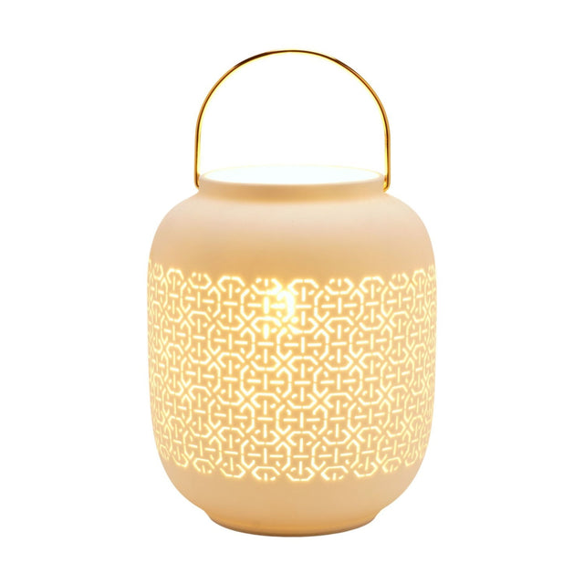 White porcelain lantern table lamp with a rounded body, cut-out geometric lattice band lit from within, and a curved gold-coloured handle, shown on a plain white background.