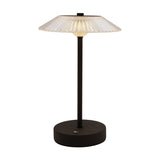 Ribbed glass USB LED touch table lamp with a clear fluted, fan-shaped shade atop a slim black stem and round black base, shown lit against a plain white background.