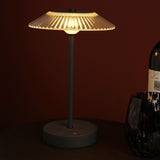 Ribbed Glass USB LED Touch Table Lamp with a wide fluted clear shade, slim black stem and round black base, shown lit on a dark table beside a wine bottle and glass.