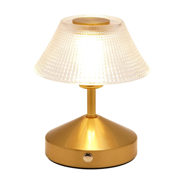 Small table lamp with a tapering diamond-etched glass shade and brushed brass-toned base with touch control button, shown lit on a white background.