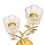 Floral Branch Double Metal Candle Holder in gold with two clear ribbed, scalloped-rim glass cups atop leafy daisy-branch stems, shown on a white background.