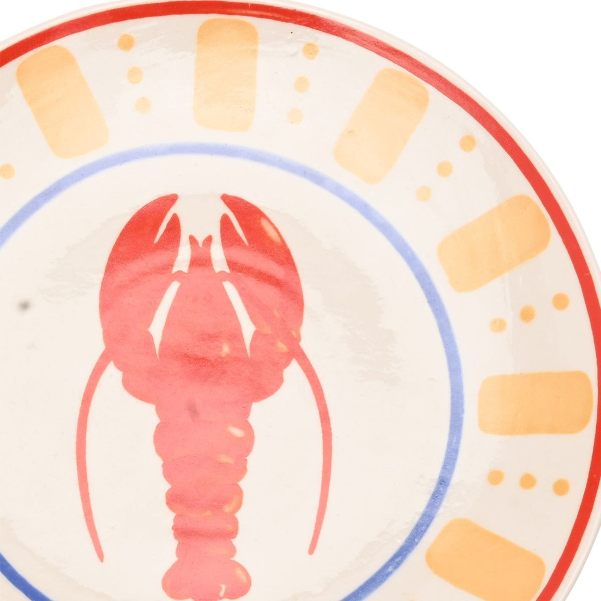 Round lobster dinner plate in cream with a central red lobster, blue ring border, and outer band of orange dashes and dots edged in red.