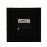 Rear view of the Square Glitter Leaf Design Mantel Clock in grey, showing the black clock mechanism, AA battery compartment, and specification label.
