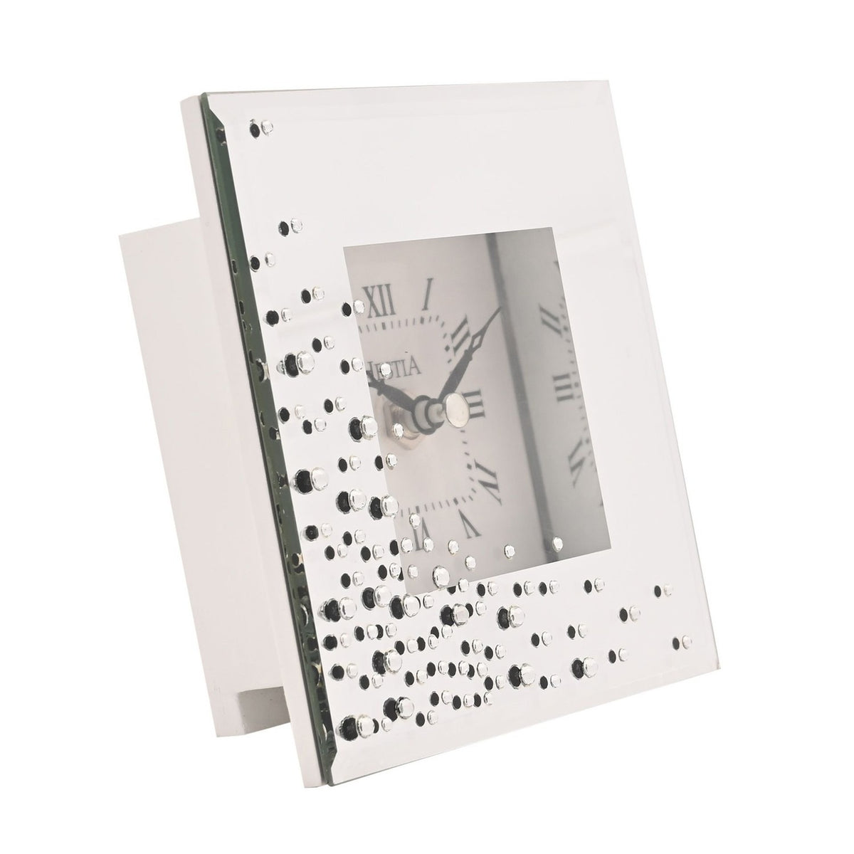 Square mirrored mantel clock with scattered diamante accents and a white Roman numeral dial, shown on a side stand against a plain white background.