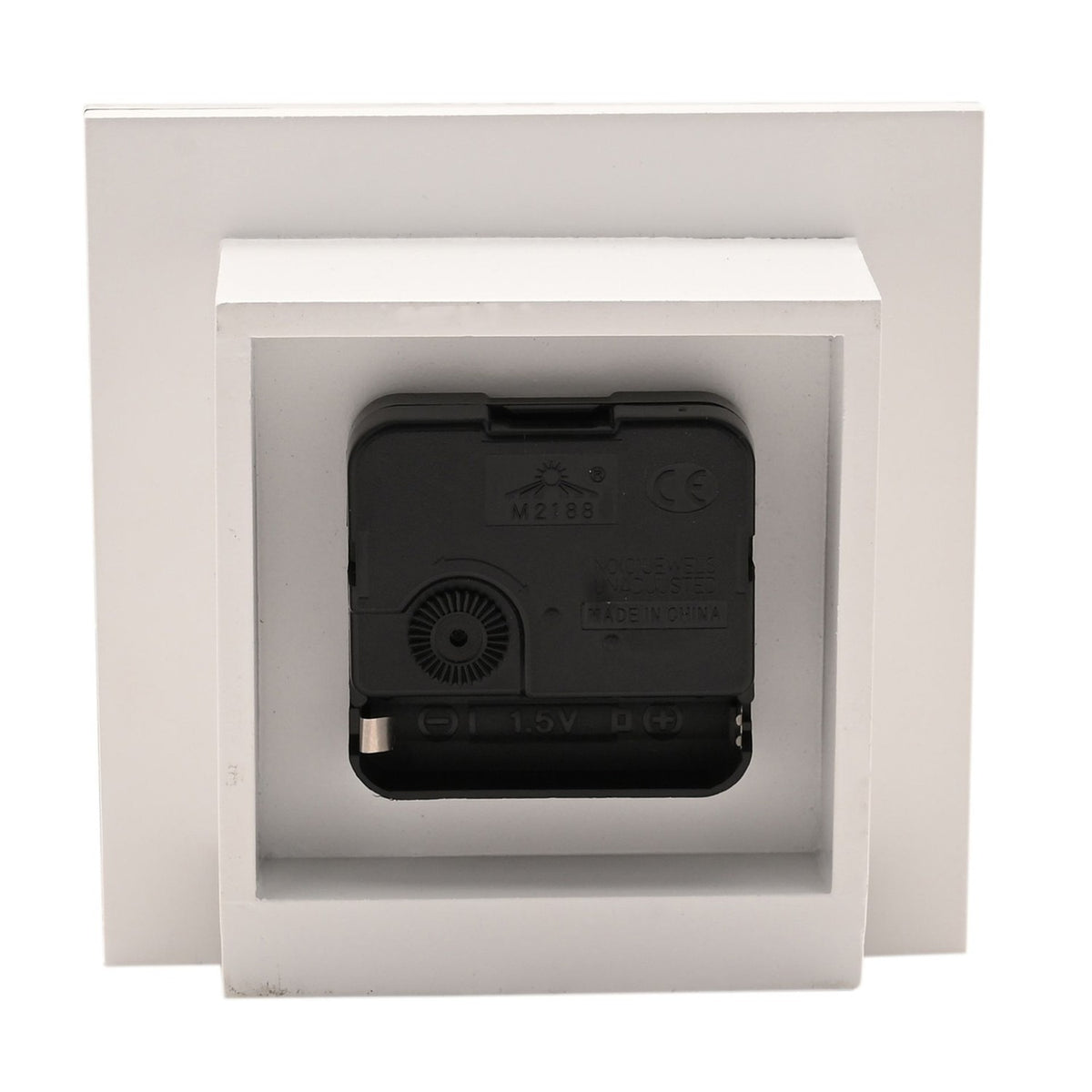 Rear view of the Scatter Diamante Square Mantel Clock showing the black battery-operated quartz clock movement with 1.5V compartment, set within a white square casing on a plain background.
