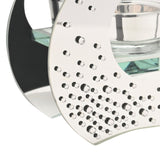Close-up of the Scatter Diamante Single Tealight Glass Candle Holder in silver, showing the mirror-bright round panel with clear diamante clusters around the glass tealight cup.