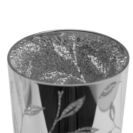 Close-up of the Glitter Leaf battery operated glass tube table lamp in mirror silver finish, showing glitter beads inside the rim and etched leaf stems on the glass surface.