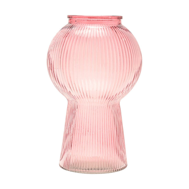 Ribbed pink glass vase with a round balloon body, flared pedestal base, and short neck, shown on a plain white background.
