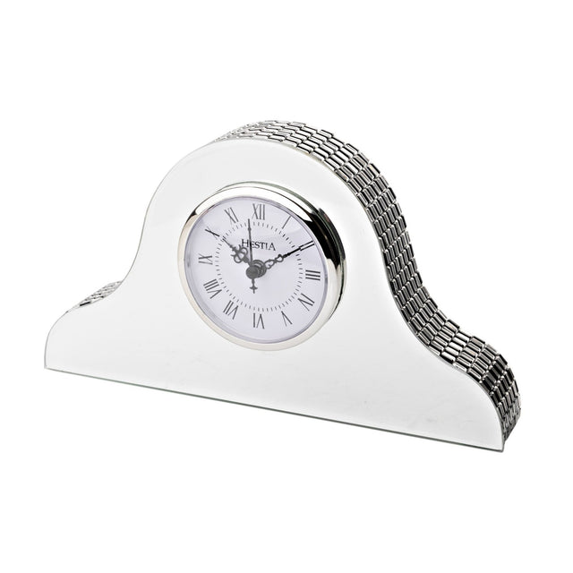 Silver Napoleon mantel clock with mirrored glass front, arched silver-tiled top, and white Roman numeral dial, shown on a plain white background.